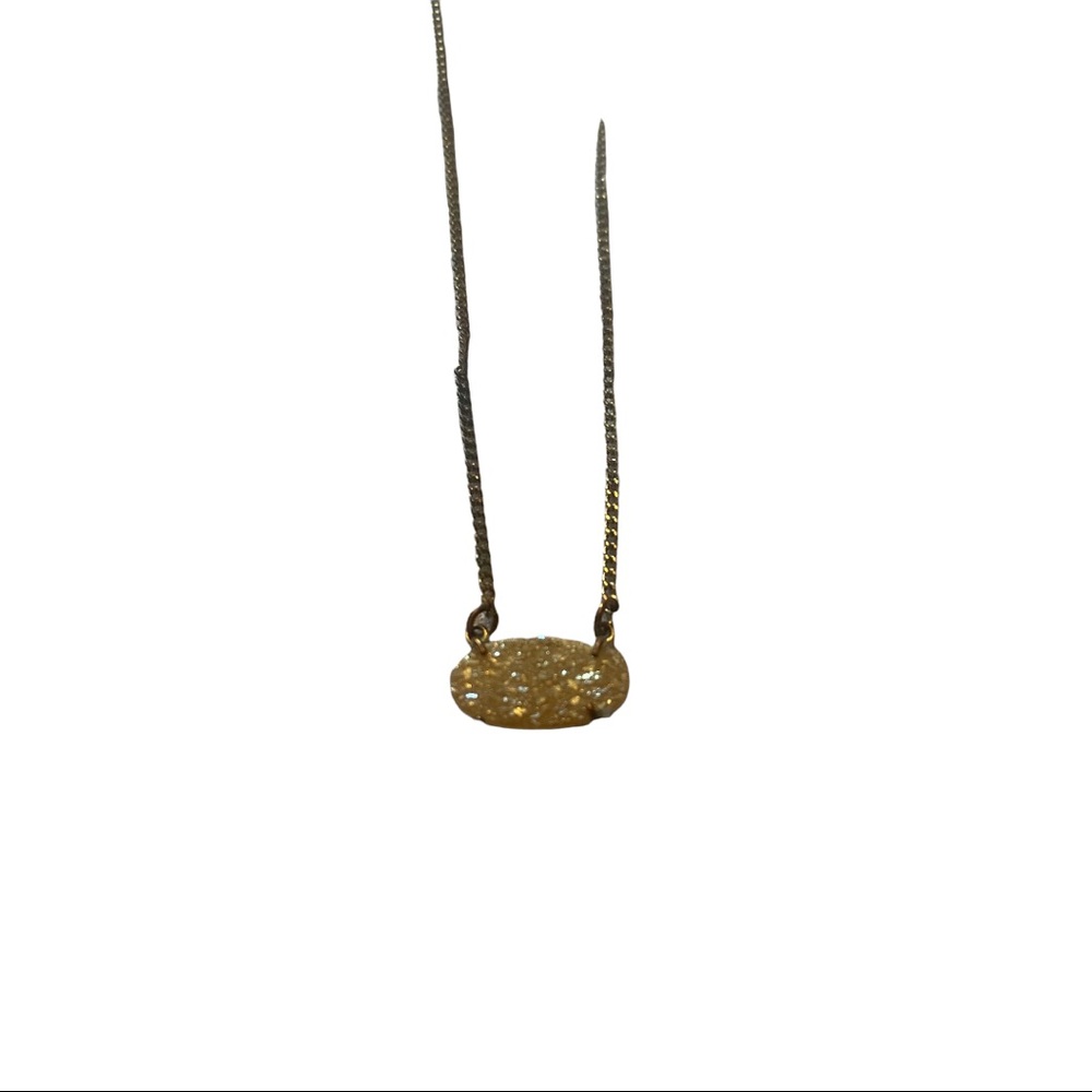 Gem on gold tone chain